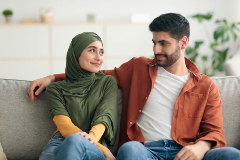 happy muslim wife wearing hijab looking husband sitting indoors 1024x683 1