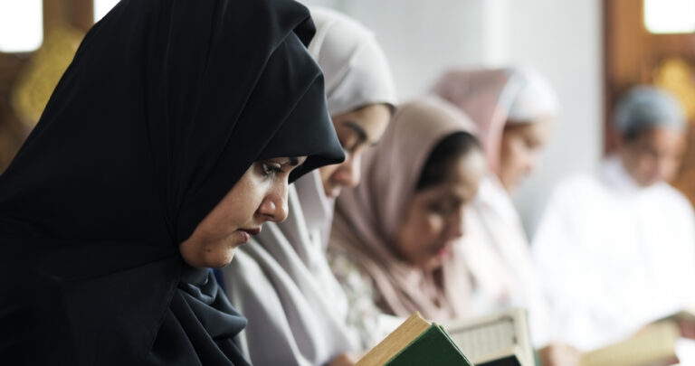 muslim women reading quran mosque during ramadan