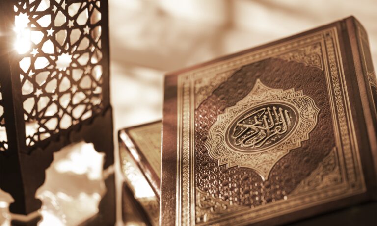 islamic book koran with rosary grey
