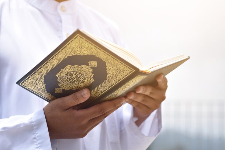 muslim man reading holy quran islamic concept
